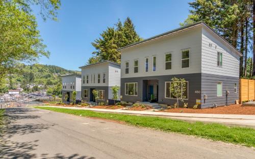 a house on the side of a road at Harbor Lights 3 New 2024, Hot Tub, Pet OK in Depoe Bay