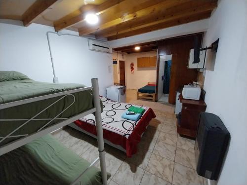 Ένα ή περισσότερα κρεβάτια σε δωμάτιο στο Guenechen