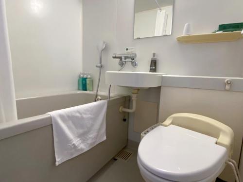 Un baño de Hotel Route-Inn Uozu