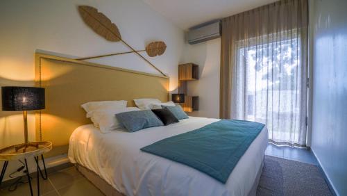 Le Gaetana Hotelにあるベッド