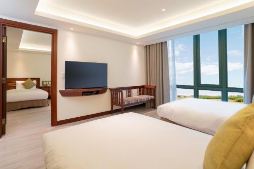 TV a/nebo společenská místnost v ubytování Formosan Naruwan Hotel
