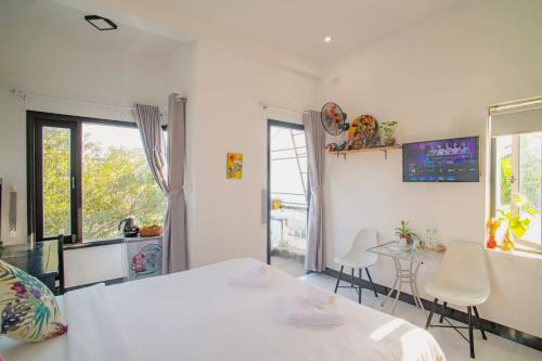 Cama o camas de una habitación en Sophia Homestay Hoi An