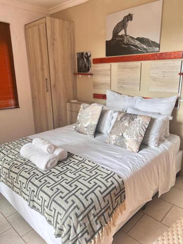 Katil atau katil-katil dalam bilik di MRH Self Check- In Express Homestay