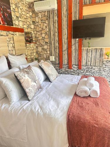 Televisyen dan/atau pusat hiburan di MRH Self Check- In Express Homestay