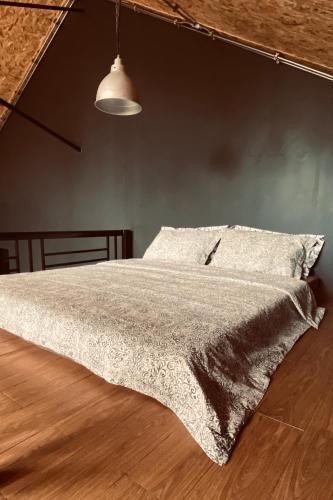 Katil atau katil-katil dalam bilik di 98 Mae Ram Residence