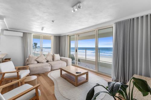 a living room with a view of the ocean at Viscount on the Beach in Gold Coast