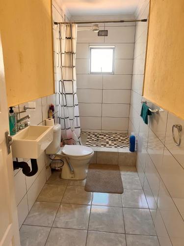 Ένα μπάνιο στο HavenNest Guest House
