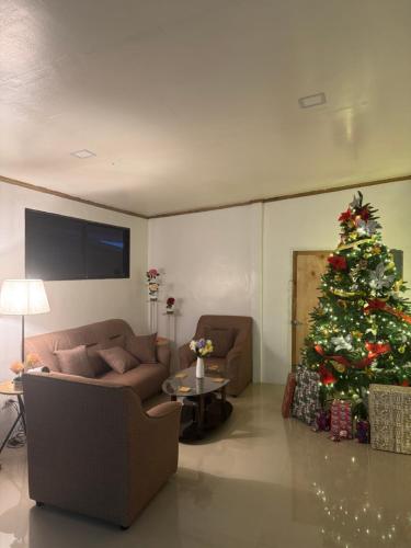 Posezení v ubytování Vasquez Residence Cozy Homestay