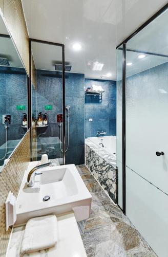Ein Badezimmer in der Unterkunft Hotel The Class
