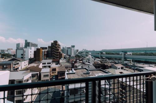 Nespecifikovaný výhled na destinaci Fukuoka nebo výhled na město při pohledu z apartmánu
