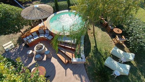 an overhead view of a swimming pool in a backyard at DREAM house by the sea in Epanomi