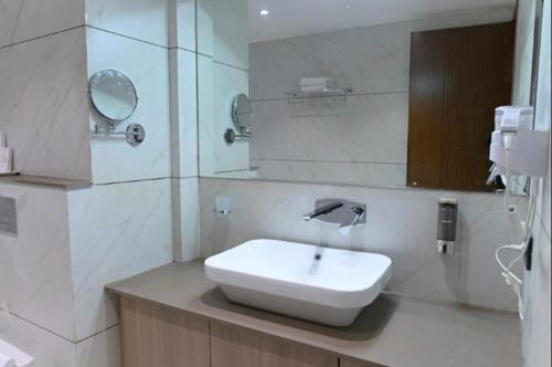 Ένα μπάνιο στο Hotel Varshish Inn