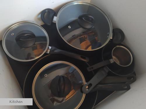 a traffic light with three mirrors on it at DREAM house by the sea in Epanomi