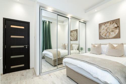 Postel nebo postele na pokoji v ubytování Luxury-1Bed-Apartment