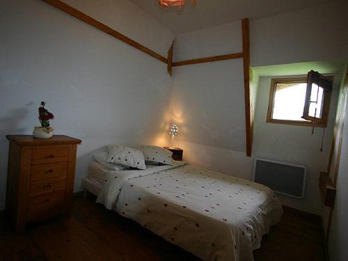 Cama o camas de una habitación en Gites de la Ferme de l'Eglise