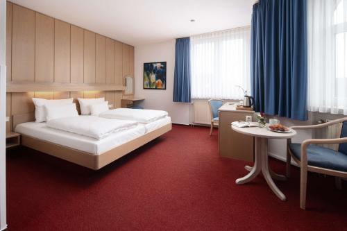 Postel nebo postele na pokoji v ubytování Best Western Hotel Heide