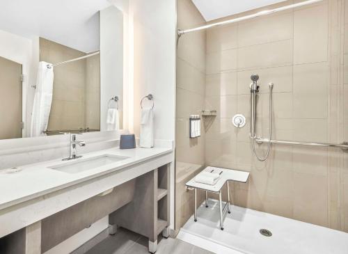 a bathroom with a sink and a shower at Hyatt House Houston Medical Center in Houston