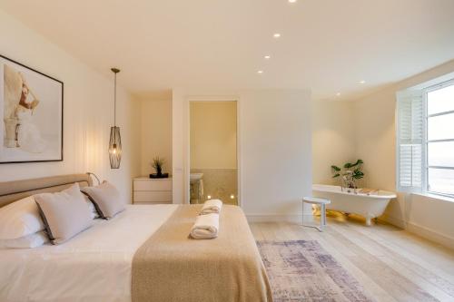 Кровать или кровати в номере Chalet Saunton