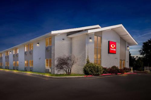 a large building with a sign on the side of it at Econo Lodge in Idaho Falls