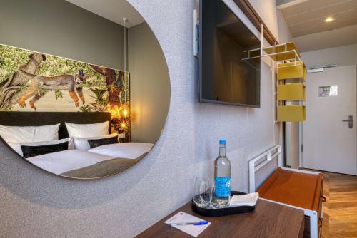 Cama o camas de una habitación en Vienna House Easy by Wyndham Hamburg Bergedorf