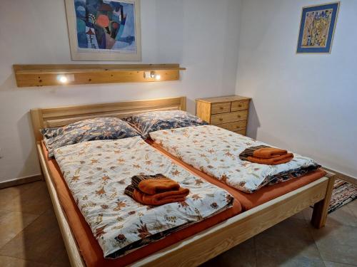 Postel nebo postele na pokoji v ubytování Apartmány Ester