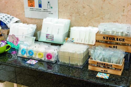 a counter top with a bunch of products on it at 青森フォレストホテル アネックス in Aomori