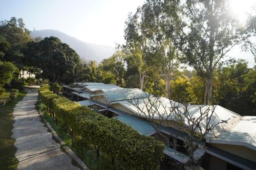 a row of boats parked next to a fence at The Solluna Resort in Marchula
