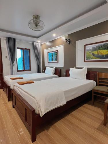 Ένα ή περισσότερα κρεβάτια σε δωμάτιο στο The Hive Hostel - Tam Coc