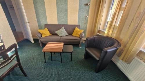 Posezení v ubytování Ferienwohnung Raguse, 15081