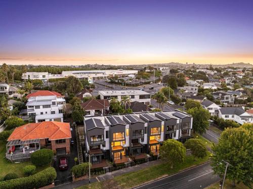 an aerial view of a city with houses at Mission Bay 4 bedrooms Tidy Unit in Auckland