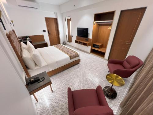 TV a/nebo společenská místnost v ubytování Haldi Kumkum Resort