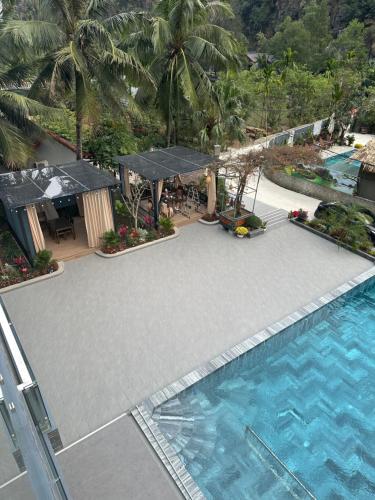 an overhead view of a swimming pool at a resort at Tam Coc Wonderland Lodge in Ninh Binh