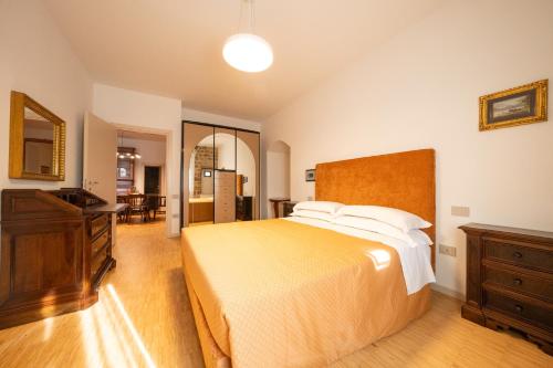 Ένα ή περισσότερα κρεβάτια σε δωμάτιο στο Roberto - CASA VACANZE BALDASSINI N 15