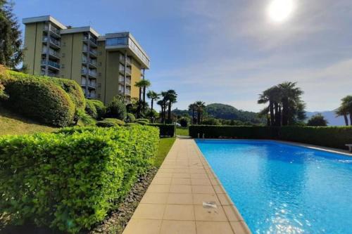 Kolam renang di atau dekat dengan Tennis & Swim Apartment
