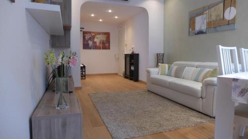 a living room with a couch and a table at Your Home at Rome in Rome