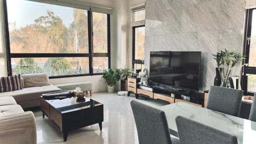 TV a/nebo společenská místnost v ubytování Kinmen 2 Home Puju Homestay