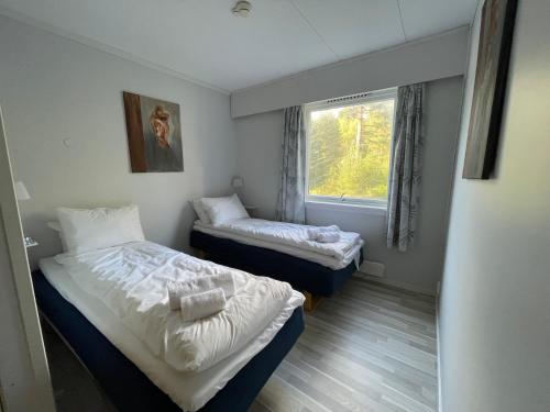 Postel nebo postele na pokoji v ubytování Fossanåsen Hotel