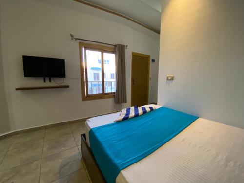 Postel nebo postele na pokoji v ubytování Seaview Hotel Dahab