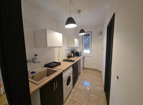 A kitchen or kitchenette at Come.in