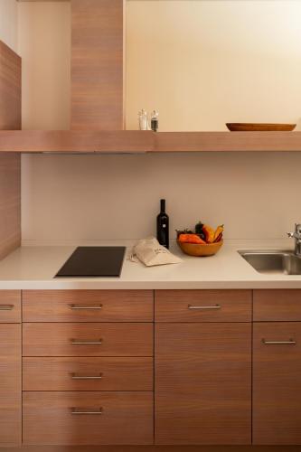Una cocina o zona de cocina en Pergola Residence