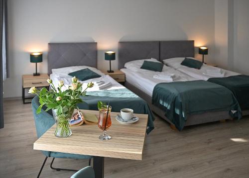 Posteľ alebo postele v izbe v ubytovaní Dobrzyński Resort Hotel Nefryt