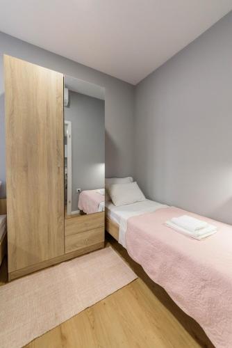 Katil atau katil-katil dalam bilik di Apartman Poluotok 2