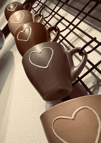 a group of hearts cookies sitting on a cooling rack at Il Cammino in San Quirico dʼOrcia