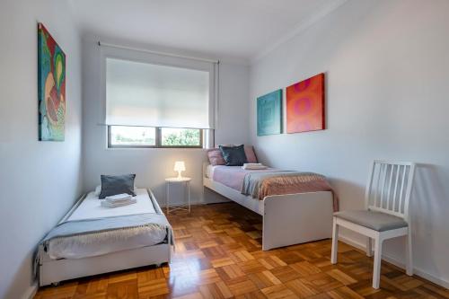 Postel nebo postele na pokoji v ubytování Sunset Guest Home