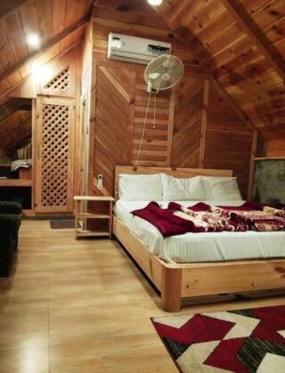 Galería fotográfica de The Stonewood Cottage Of Country Club Balakot en Pori