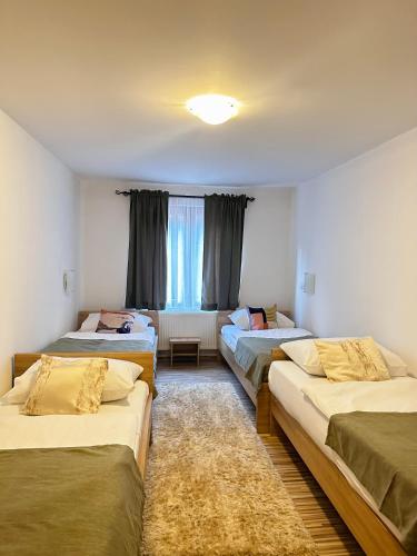 Ένα ή περισσότερα κρεβάτια σε δωμάτιο στο Motel Stovrela