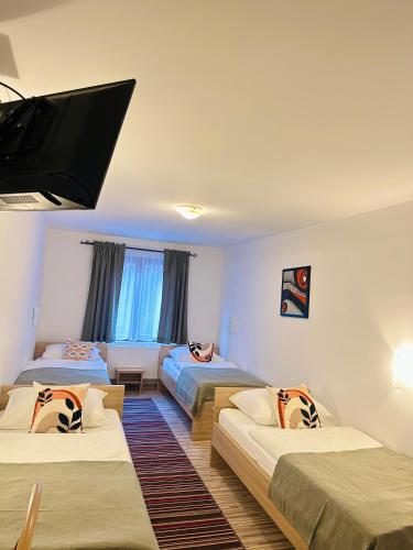 Ένα ή περισσότερα κρεβάτια σε δωμάτιο στο Motel Stovrela
