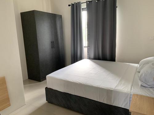 Llit o llits en una habitació de LuxNar Beach GF