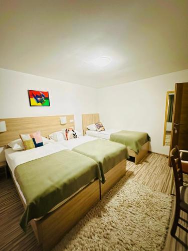 Ένα ή περισσότερα κρεβάτια σε δωμάτιο στο Motel Stovrela