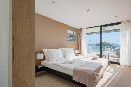 Postel nebo postele na pokoji v ubytování Boutique Hotel Esplanade